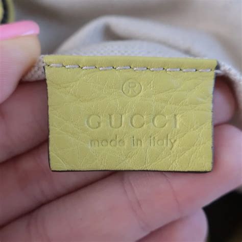 accesso gucci tag.